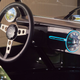 A photo of the Meyers Manx interior with blue light around the speedo.